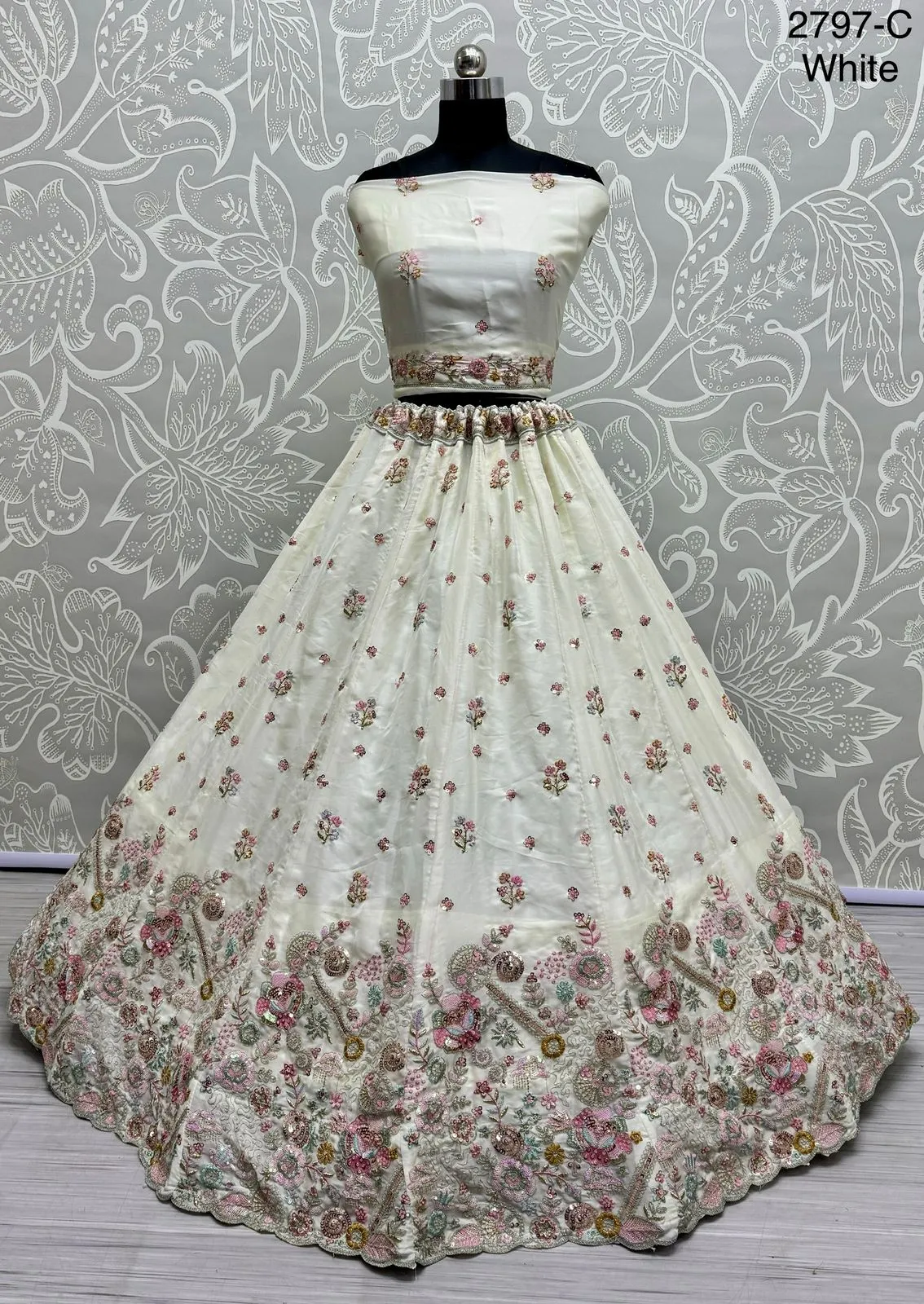White Bridal Silk Lehenga with Stunning Embroidery and Stone Work